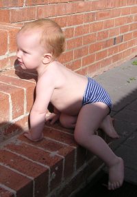 A nappy free baby has fun!