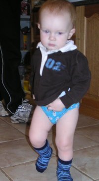 Practicing in knickers around one year old.